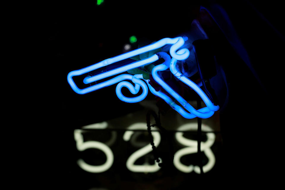 <p>A neon light in the shape of a gun forms part of an artwork exhibited in God’s Own Junkyard gallery and cafe in London, Britain, May 13, 2017. (Photo: Russell Boyce/Reuters) </p>