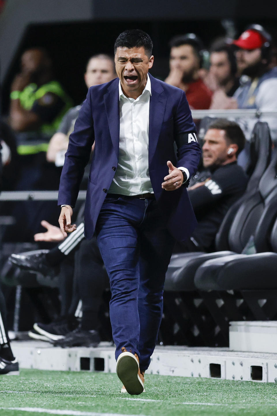 Atlanta United head coach Gonzalo Pineda reacts during the second half of an MLS soccer match against Toronto FC, Saturday, March 4, 2023, in Atlanta. (AP Photo/Alex Slitz)