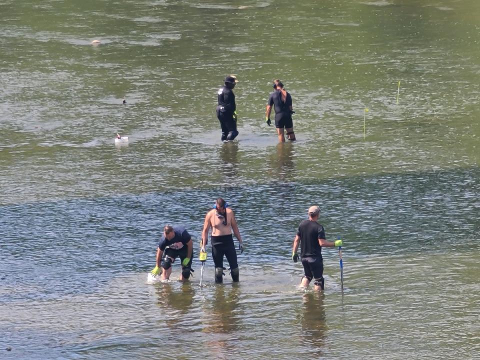 The officers from the Indiana State Police used metal detectors and shovels to search the river (Courtesy of The Murder Podcast)