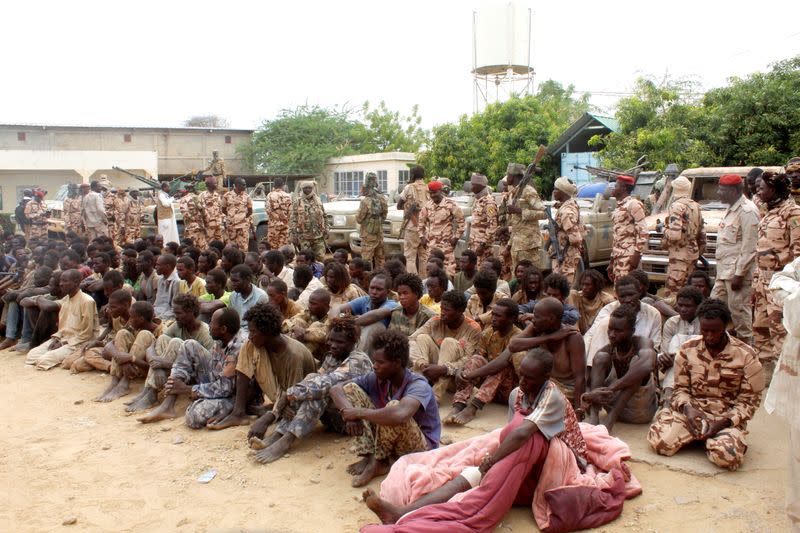 Captured FACT rebels are pictured at army headquarters in N'Djamena