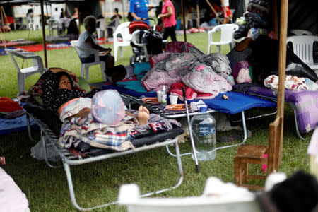 People rest at a shelter set up by the army in Jojutla de Juarez, Mexico September 21, 2017. REUTERS/Edgard Garrido