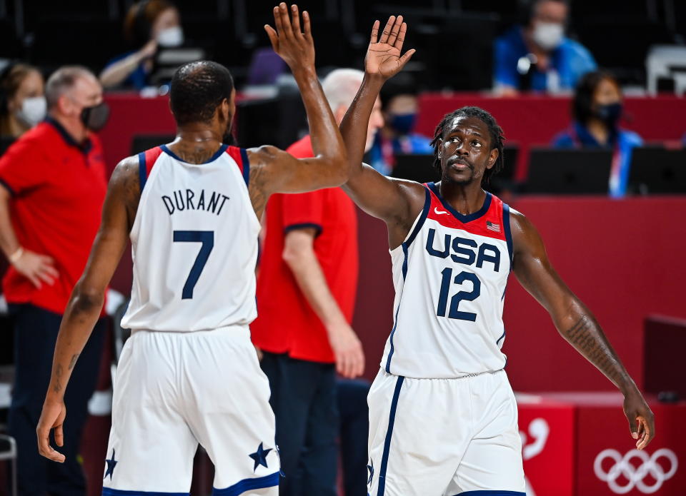 Jrue Holiday, right, and Kevin Durant led the way as USA men's basketball beat France to win Olympic gold. (Brendan Moran/Sportsfile via Getty Images)