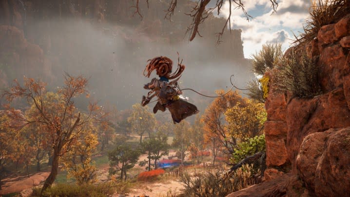 Aloy using a grappling hook in Horizon Forbidden West.