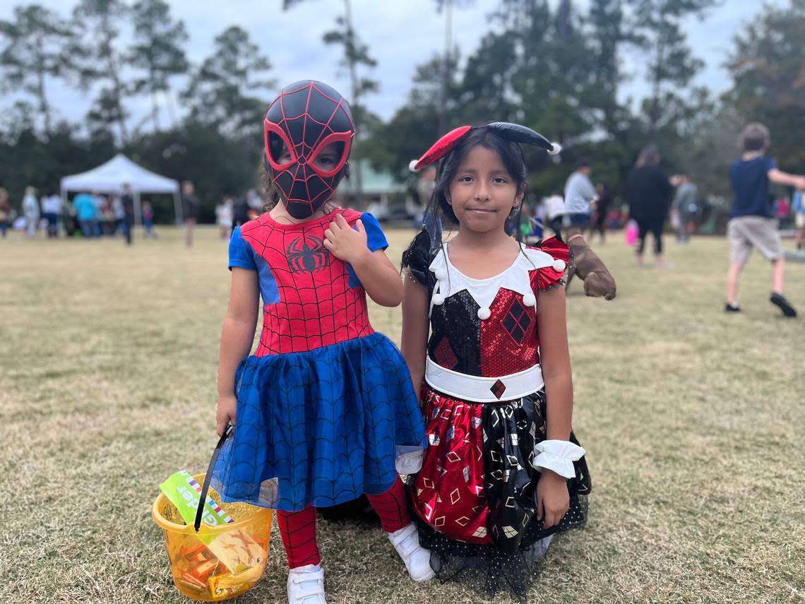 Kamilah and Andrea Lobaton showed off their costumes and talked about their favorite candy at the Bluffton Police Department’s Spooktacular event Friday at Oscar Frazier Park.