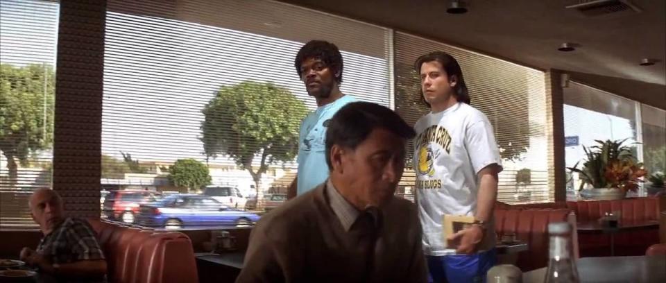 Samuel L. Jackson and John Travolta walk through the diner at the end of 'Pulp Fiction'