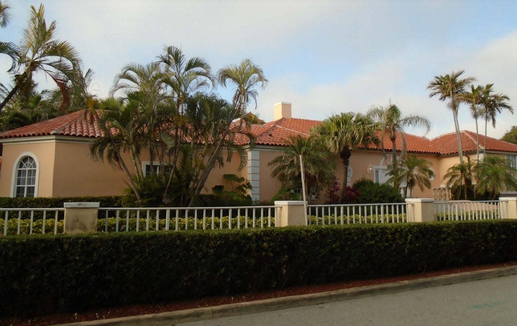 An ownership company controlled by former President Donald Trump owns this Mediterranean-style house at 1094 S. Ocean Boulevard. It stands directly across the street from a lot where a new house is expected to be built at 1090 S. Ocean Blvd.