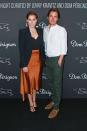 <p>At the Lenny Kravitz & Dom Perignon 'Assemblage' exhibition, Beatrice wore a burnt orange slip skirt with a sweetheart tank, a fitted black blazer, and t-strap heels.</p>