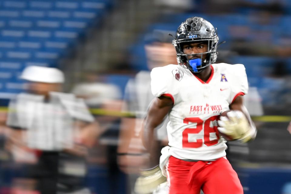 Jan 18, 2020; St. Petersburg, Florida, USA; Team East running back Adrian Killins Jr (26) runs the ball during the fourth quarter against the Team West at Tropicana Field. Mandatory Credit: Douglas DeFelice-USA TODAY Sports