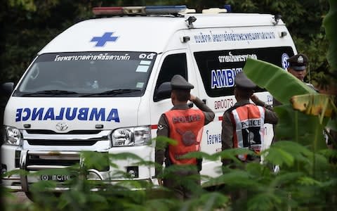 Ambulances arrive at the Tham Luang cave entrance - Credit: Ye Aung Thu/AFP