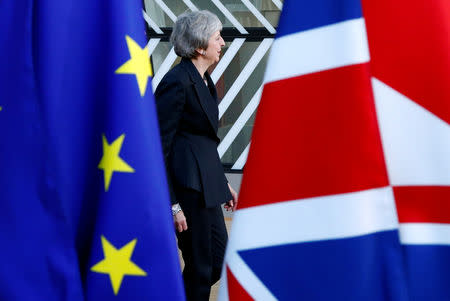 British Prime Minister Theresa May arrives at a European Union leaders summit in Brussels, Belgium December 13, 2018. REUTERS/Francois Lenoir/Files