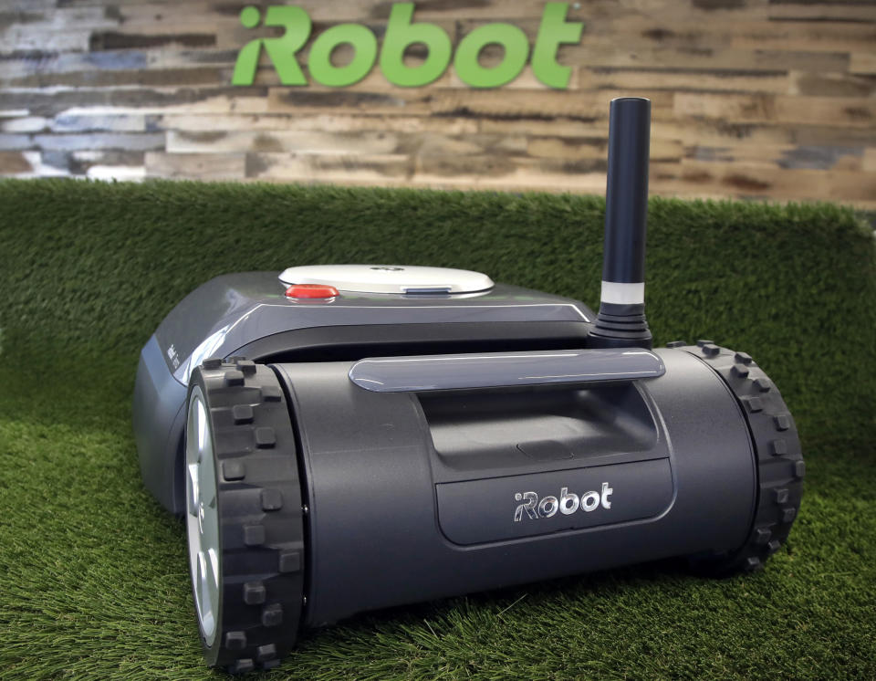 This Wednesday, Jan. 16, 2019 photo shows an iRobot Terra lawn mower in Bedford, Mass. Building a robot lawn mower seemed the logical next step for iRobot, which invented the pioneering robotic vacuum Roomba. But the company’s secret, decade-plus lawn mower project was a lot harder than anyone expected. (AP Photo/Elise Amendola)