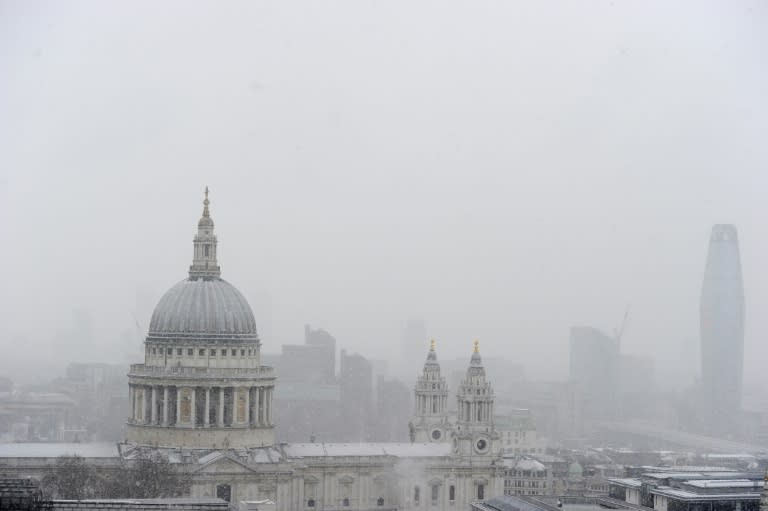 Snow falls on St Paul's Cathedral in London as the so-called "Beast from the East" takes hold