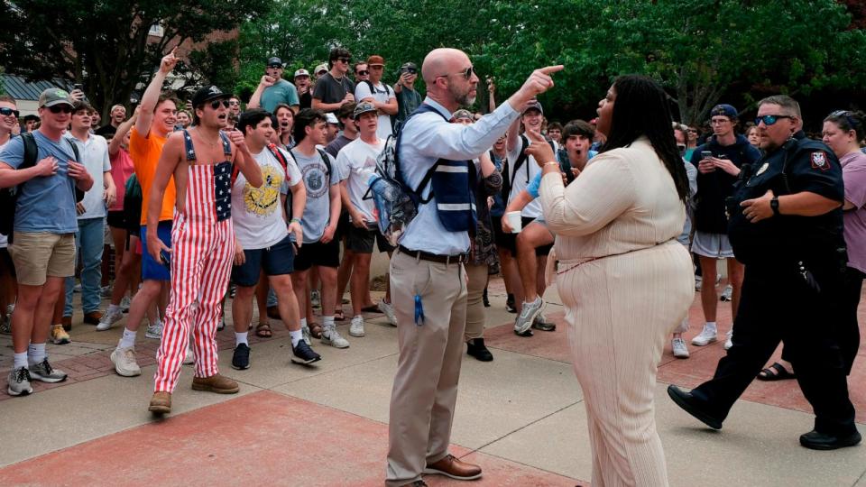 PHOTO: A neutral campus organizer, center, tries to direct a pro-Palestinian demonstrator away from being so close to a group of counter-protesters at the University of Mississippi, May 2, 2024, in Oxford, Miss. (Antonella Rescigno/The Daily Mississippian via AP)