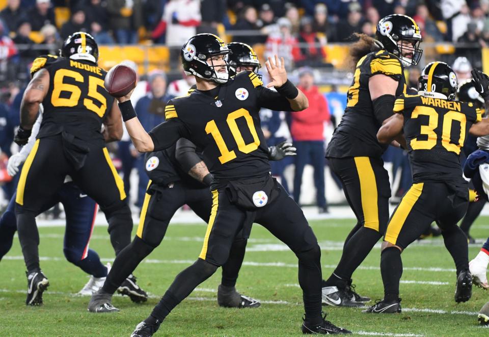 Dec 7, 2023; Pittsburgh, Pennsylvania, USA; Pittsburgh Steelers quarterback Mitch Trubisky (10) throws down field against the New England Patriots during the second quarter at Acrisure Stadium. Mandatory Credit: Philip G. Pavely-USA TODAY Sports