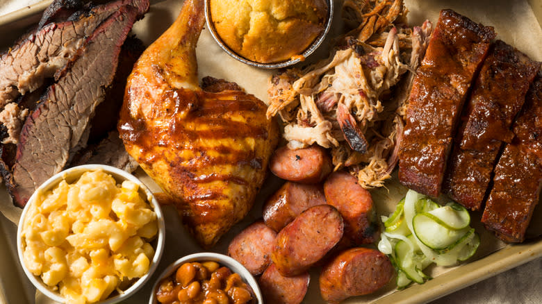 platter of barbecue meats and sides