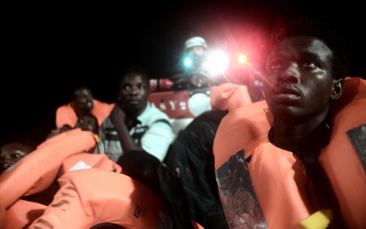 Migrants who were rescued by members of the rescue ship Aquarius, which was turned away from Italy and Malta before being taken in by Spain in a crisis emblematic of the EU divisions over migration.  - Reuters