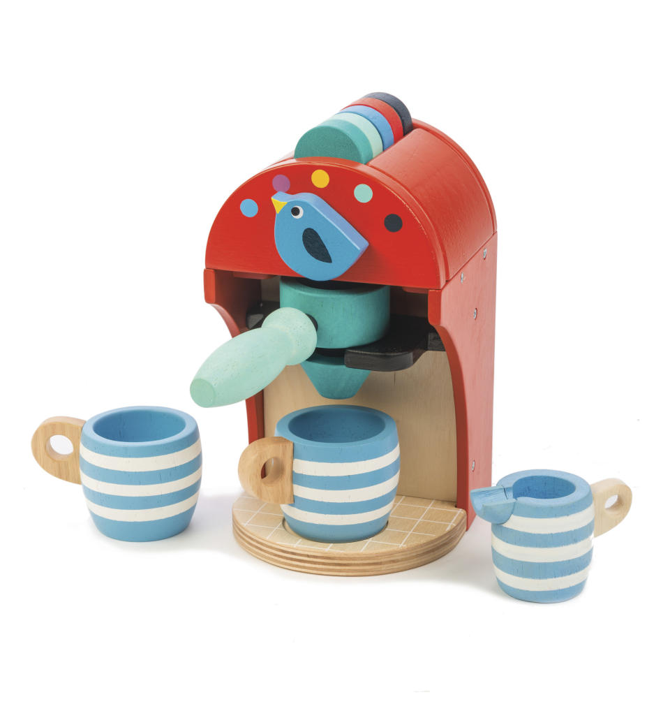 This photo released by Tender Leaf Toys shows the wooden toy Espresso Machine, complete with coffee pods that drop and a milk jug. (AP Photo/Tender Leaf Toys)