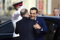 Greece Prime Minister Alexis Tsipras, right, is welcomed by Malta Prime Minister Joseph Muscat on the occasion of the Mediterranean Summit of Southern EU countries in Valetta, Malta, Friday, June 14, 2019. (AP Photo/Jonathan Borg)