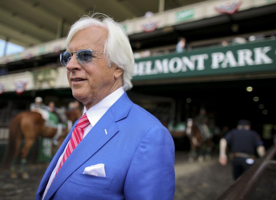 FILE - Trainer Bob Baffert walks out to the winner's circle after the Brooklyn Invitational Stakes horse race at Belmont Park, Saturday, June 9, 2018, in Elmont, N.Y. A retired New York State Supreme Court Justice has recommended a two-year suspension for trainer Bob Baffert after a New York Racing Association hearing. Judge O. Peter Sherwood, who served as the hearing officer for the case, released a report with his findings Wednesday, April 27, 2022, that will be sent to a three-member panel for consideration. (AP Photo/Mary Altaffer, File)