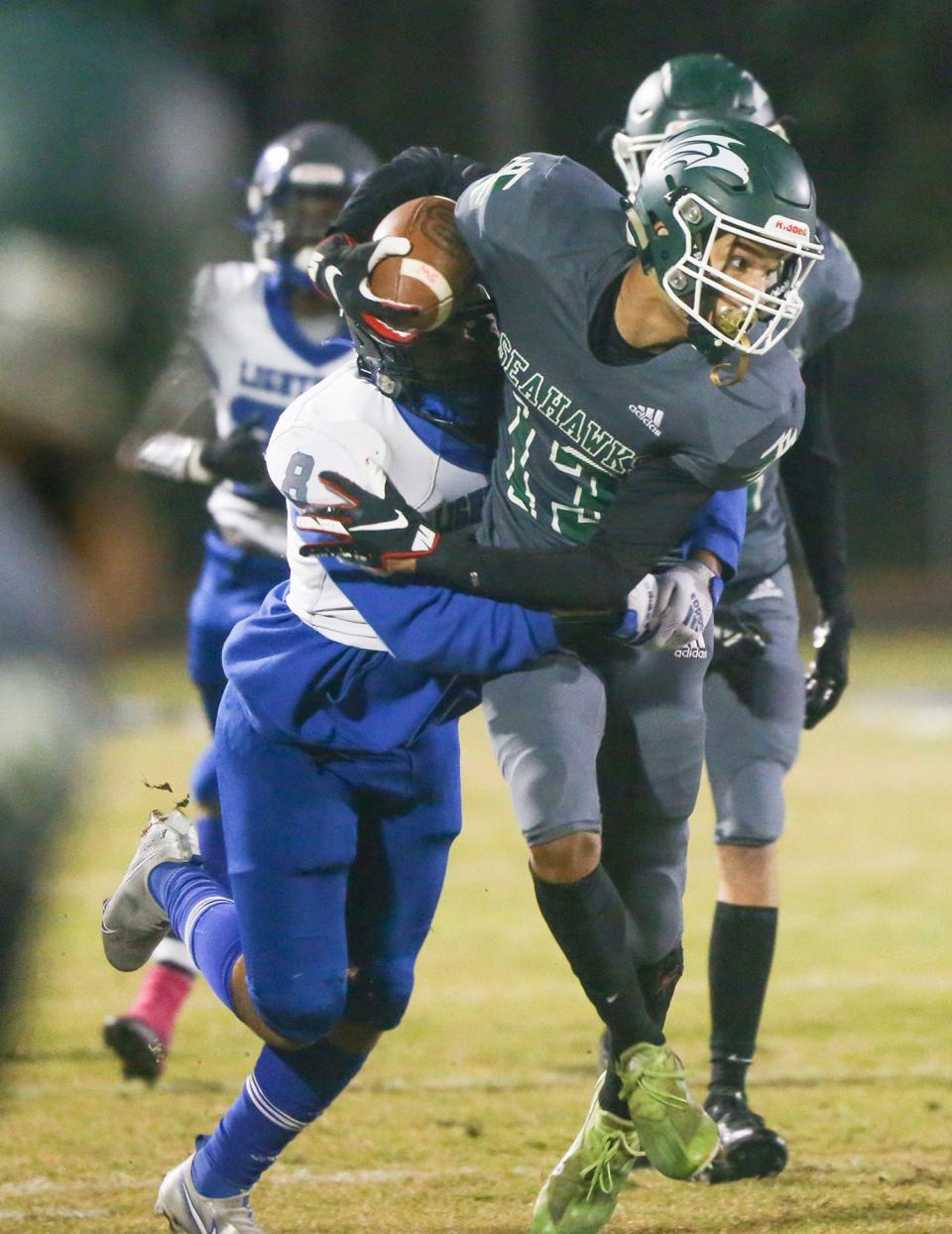 WR Maddox Porter gains yards after a catch during the Seahawks final regular season football game at home against Lighthouse Private Christian Academy.