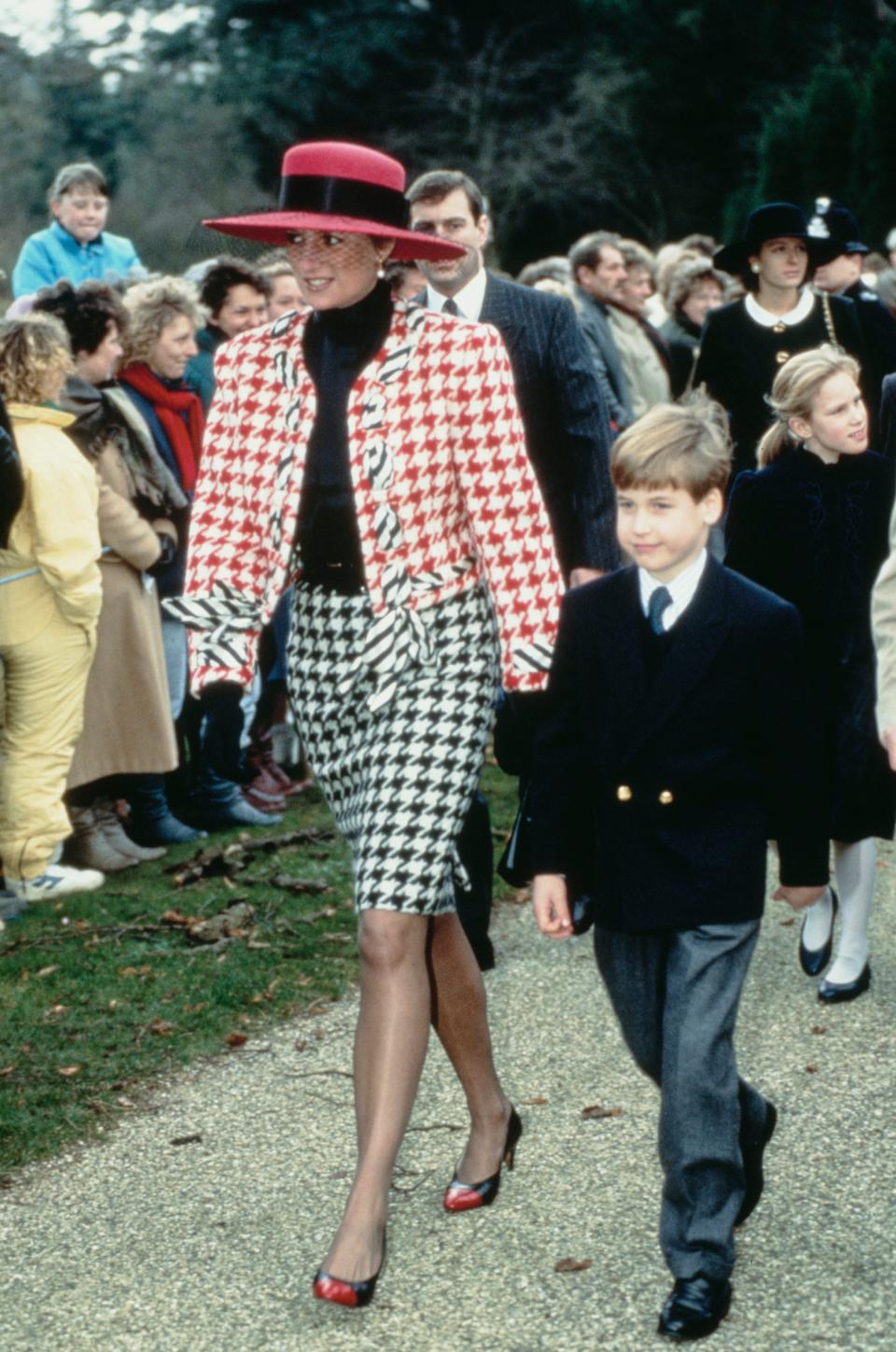 Princess Diana and Prince William at the christening of Princess Eugenie in 1990.