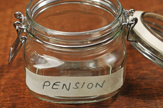 Financial problems in old age. An empty pension jar or pot.