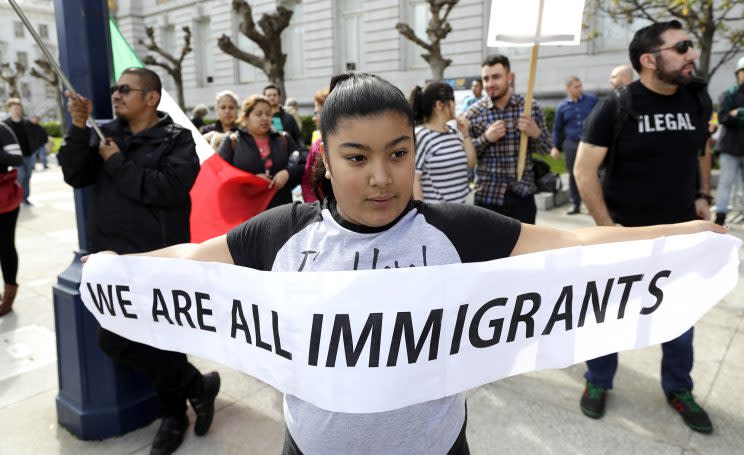 Delilah Gutierrez, 10, holds a sign during a protest against President Donald Trump's efforts to crack down on immigration, Feb. 16, 2017, in San Francisco. (Photo: Marcio Jose Sanchez/AP Photo)