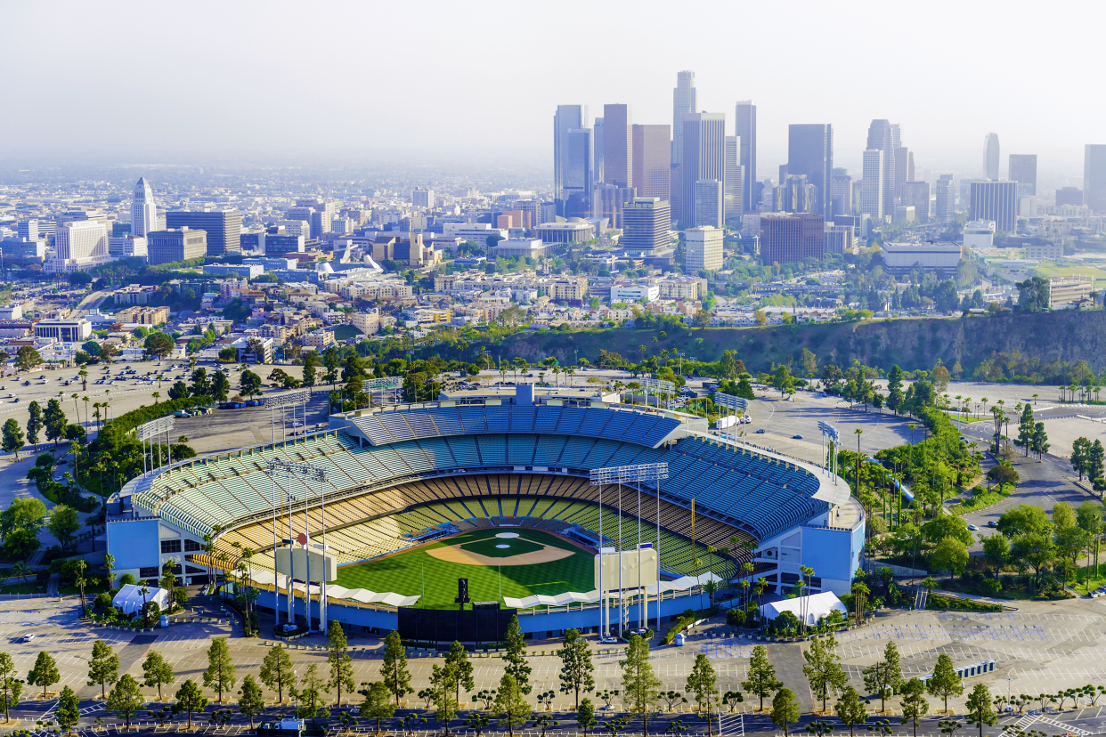 Aerial view of empty Dodger Stadium, Los Angeles, home of the Los Angeles Dodgers with downtown Los Angeles in the background