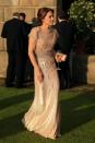 <p>Kate recycled her stunning Jenny Packham gown for a gala dinner in Norfolk. First seen wearing the champagne-coloured look in 2011, the Duchess combined her sparkly ensemble with a satin Prada clutch and the Queen's very own diamond earrings. <i>[Photo: PA]</i> </p>