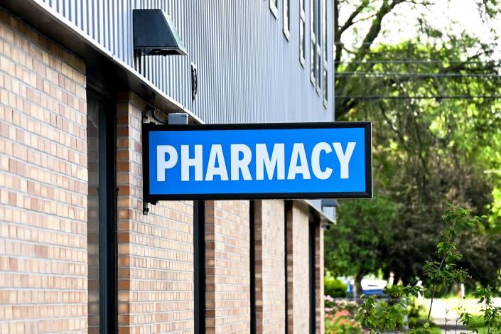 A sign for the pharmacy at the Allen Neighborhood Center on Thursday, June 9, 2022, in Lansing. The&nbsp;Ingham County Health Department will&nbsp;operate a&nbsp;federally qualified health center and pharmacy at Allen Place to provide services for everyone, regardless of their ability to pay.