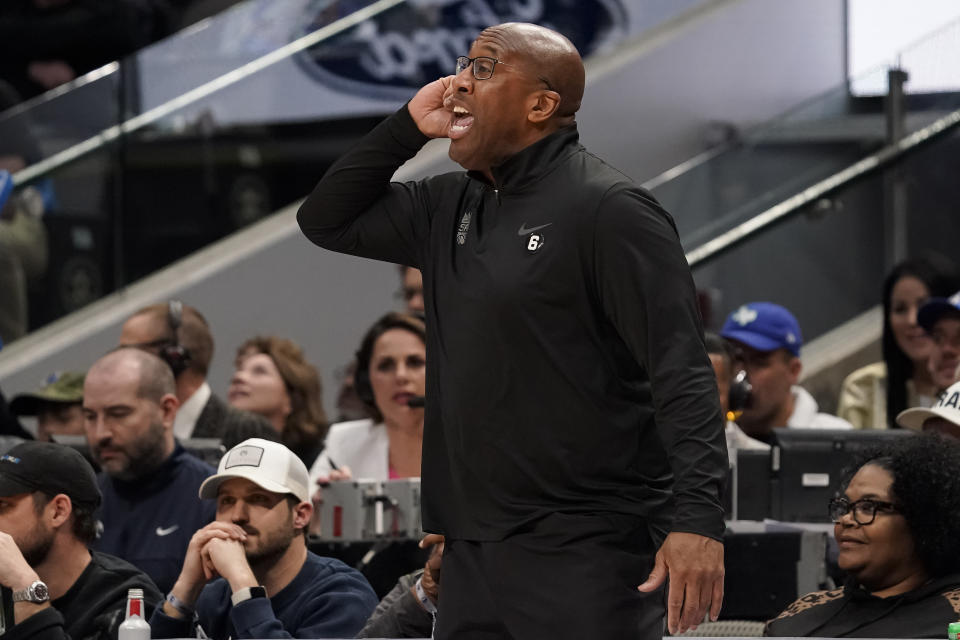 Sacramento Kings coach Mike Brown shouts instructions to the team during the first half of an NBA basketball game against the Dallas Mavericks in Dallas, Wednesday, April 5, 2023. (AP Photo/Sam Hodde)