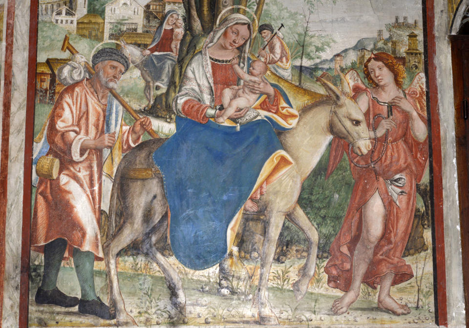 Jesus'&nbsp;flight into Egypt is depicted in a 16th-century fresco by Francesco da Milano, located in a cathedral in the Veneto region of Italy. (Photo: DEA / V. GIANNELLA via Getty Images)