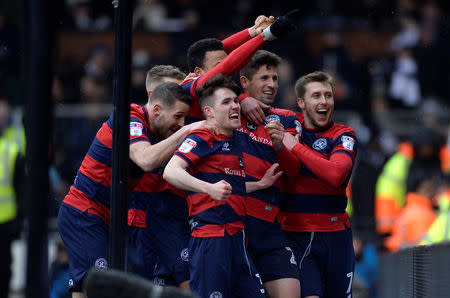 Soccer Football - Championship - Fulham vs Queens Park Rangers - Craven Cottage, London, Britain - March 17, 2018 Queens Park Rangers' Pawel Wszolek celebrates scoring their second goal with teammates Action Images/Adam Holt