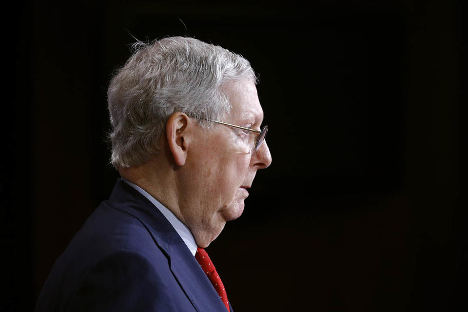 Senate Majority Leader Mitch McConnell of Ky., speaks with reporters after the Senate approved a nearly $500 billion coronavirus aid bill, Tuesday, April 21, 2020, on Capitol Hill in Washington. (AP Photo/Patrick Semansky)