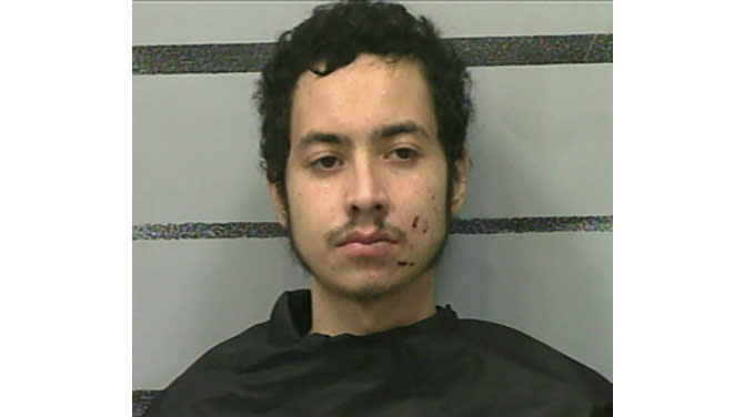 This photo provided by the Lubbock County Detention Center show Omar Soto-Chavira. Omar Soto-Chavira, a man charged in the fatal shooting of a SWAT officer in a small West Texas city during a standoff last week was charged Friday, July 23, 2021 with assaulting a federal officer who responded to the scene, prosecutors said. (Lubbock County Detention Center via AP)