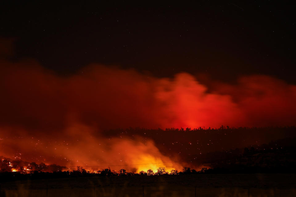 Smoke and flames rise from the Park Fire, burning near Chico, Calif., on July 25, 2024. The picture was taken with long exposure. / Credit: Fred Greaves / REUTERS