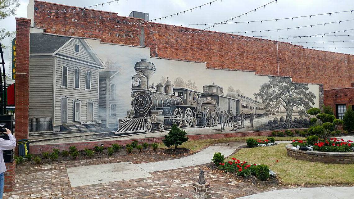 Tommy Simpson was commissioned to paint the 19th century locomotive train nicknamed the “Shoo Fly,” in Conway, S.C. Photo courtesy Tommy Simpson. JASON LEE/jlee@thesunnews.com