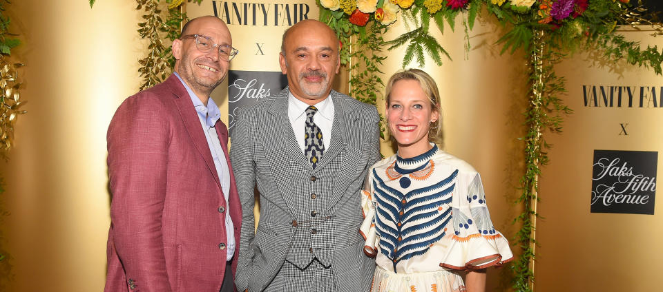 NEW YORK, NY - SEPTEMBER 12:  (L-R) Marc Metrick, Christian Louboutin, and Tracy Margolies attend as Vanity Fair and Saks Fifth Avenue celebrate Vanity Fair's Best-Dressed 2018 at Manhatta on September 12, 2018 in New York City.  (Photo by Ben Gabbe/Getty Images for Vanity Fair/Saks Fifth Avenue)