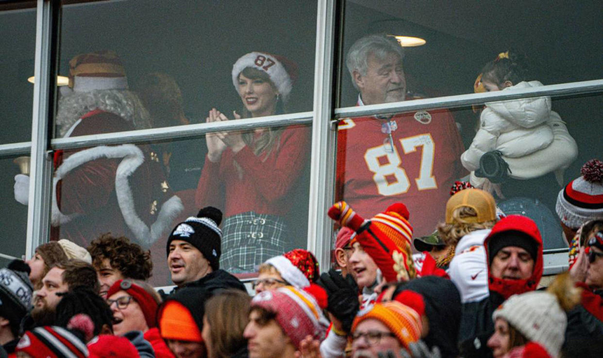 Taylor Swift watches the Kansas City Chiefs play the Las Vegas Raiders in a suite with Travis Kelce's father, Ed Kelce, Monday, Dec. 25, 2023, at GEHA Field at Arrowhead Stadium, Kansas City, Missouri.  (Emily Curiel / Kansas City Star via Getty Images)