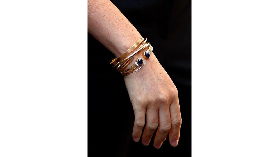 Meghan rarely takes off her Cartier bracelets