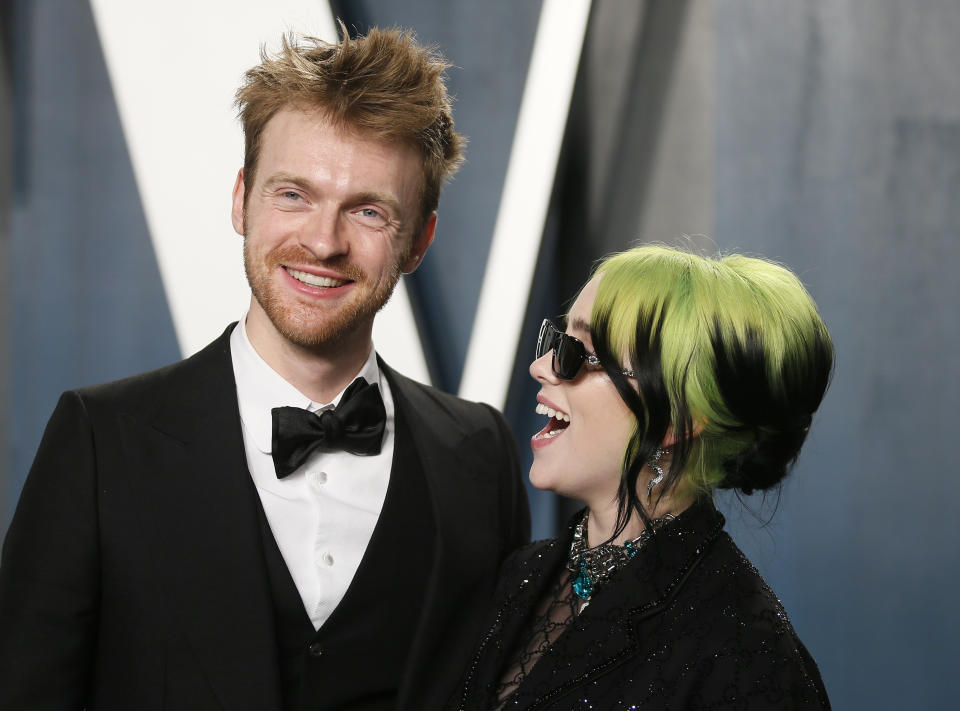 Finneas O'Connell and Billie Eilish attend the Vanity Fair Oscar party in Beverly Hills during the 92nd Academy Awards, in Los Angeles, California, U.S., February 9, 2020.    REUTERS/Danny Moloshok