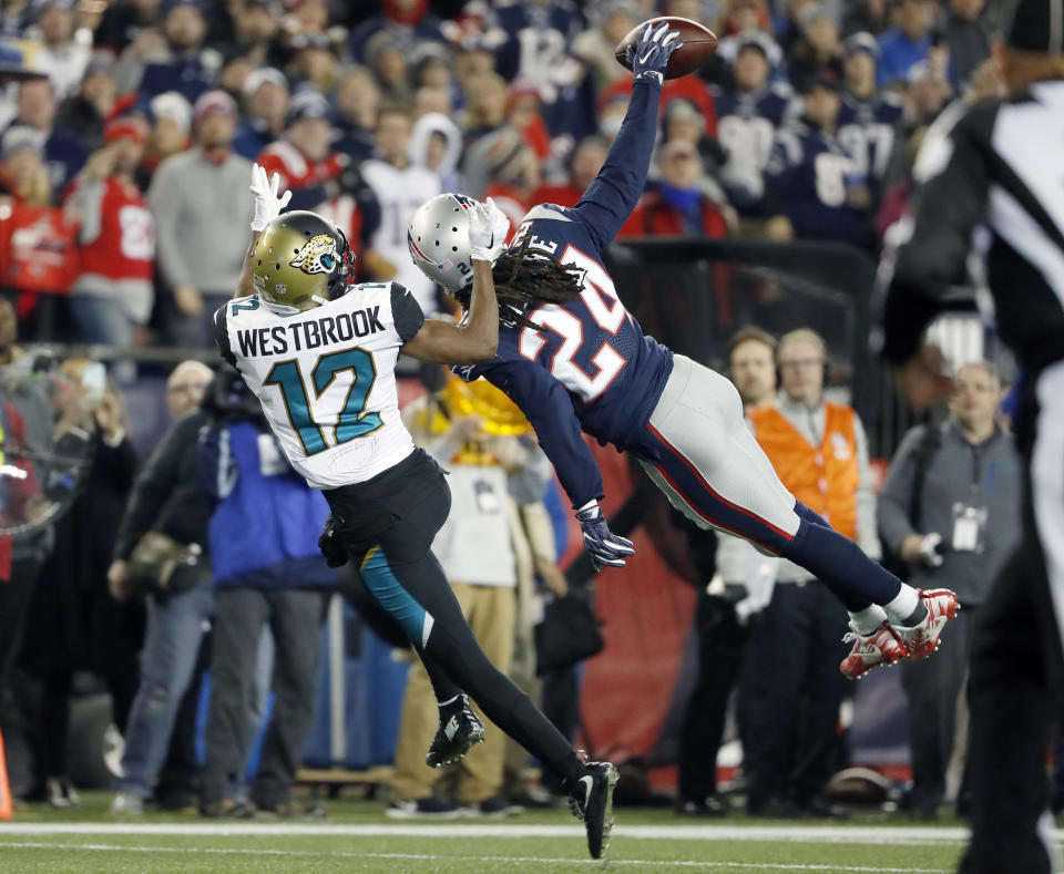 Stephon Gilmore (24) makes one of the plays of the Patriots' season, breaking up a fourth-down pass in the AFC championship game. (AP)