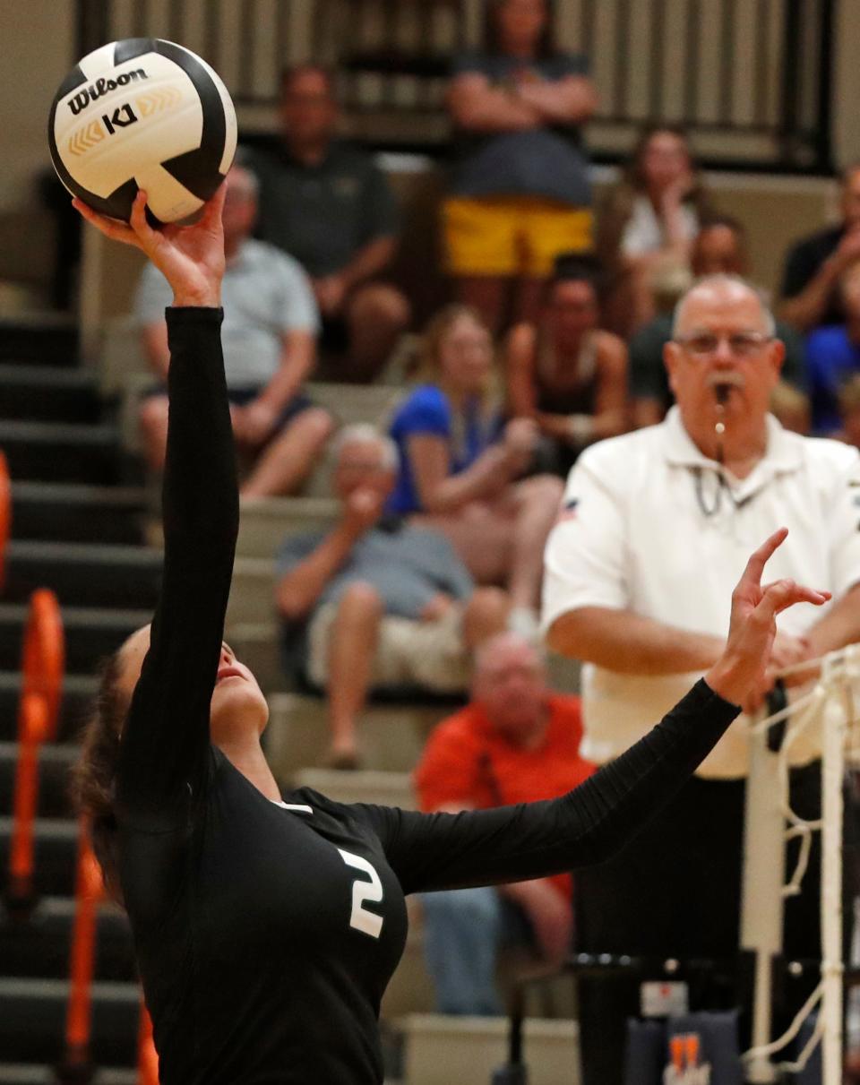 Benton Central Jaycee Strawsma (2) hits the ball during the IHSAA volleyball match against Harrison, Tuesday, Aug. 16, 2022, at Harrison High School in West Lafayette, Ind. Strawsma signed to play volleyball at Indiana Tech.