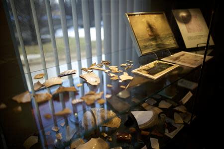 Fragments of pottery are exhibited at the museum of Duffy's Cut at Immaculata College in Malvern, Pennsylvania on March 8, 2014. REUTERS/Mark Makela