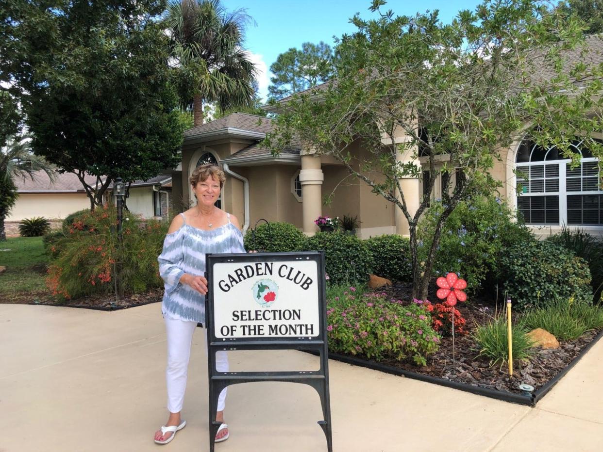 Beth Knisely and her husband, Bill, were named the Garden Club at Palm Coast's Selection of the Month.