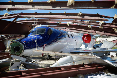 A damaged HondaJet is seen at the Eufaula Municipal Airport, after a string of tornadoes, in Eufaula, Alabama, U.S., March 5, 2019. REUTERS/Elijah Nouvelage