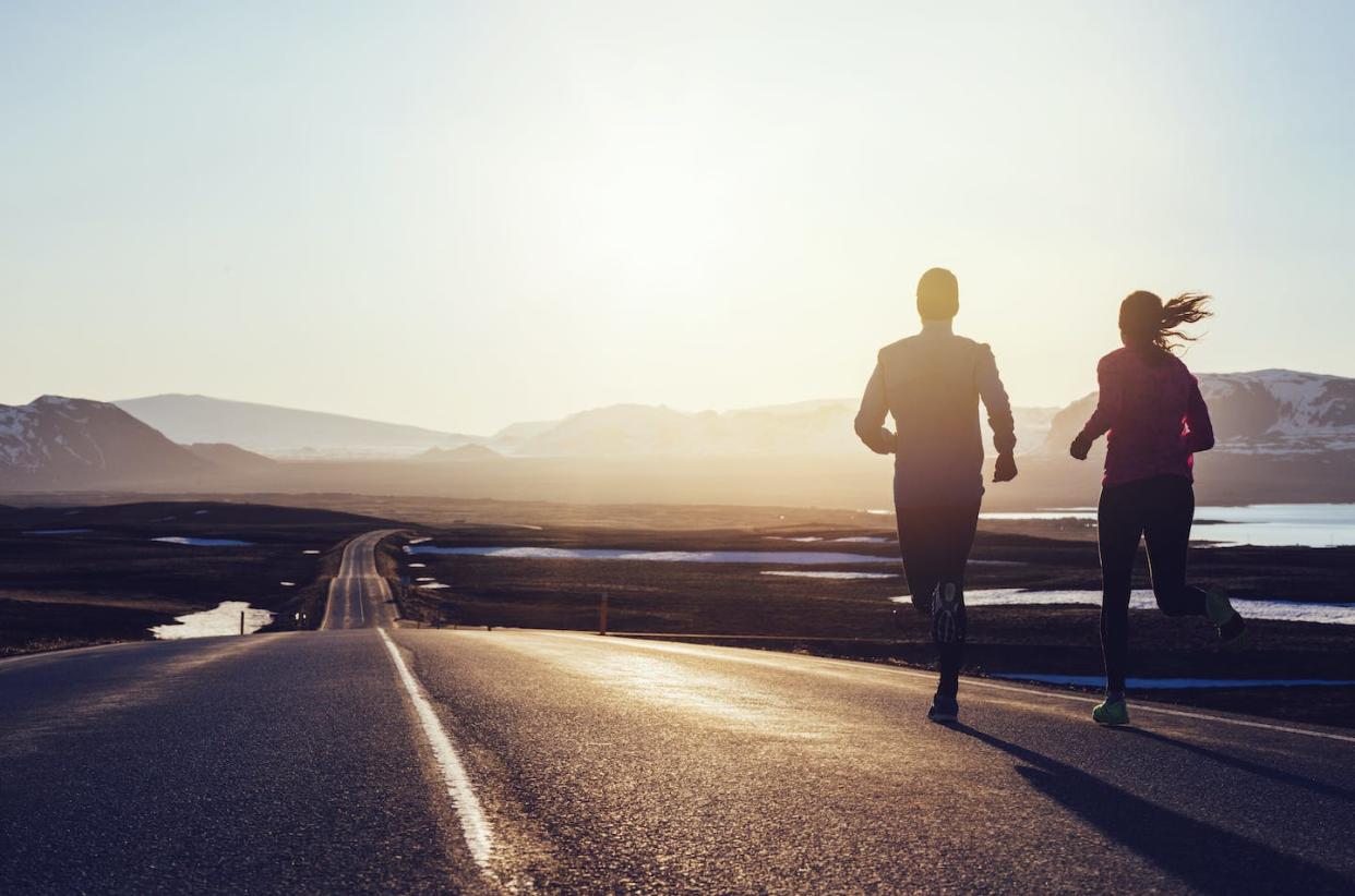 Exercise spurs the release of the body's natural cannabinoids, which have myriad benefits for mental health and stress relief. <a href="https://www.gettyimages.com/detail/photo/running-along-road-at-sunrise-in-iceland-royalty-free-image/578633163?adppopup=true" rel="nofollow noopener" target="_blank" data-ylk="slk:Luca Sage/Stone via Getty Images;elm:context_link;itc:0;sec:content-canvas" class="link ">Luca Sage/Stone via Getty Images</a>