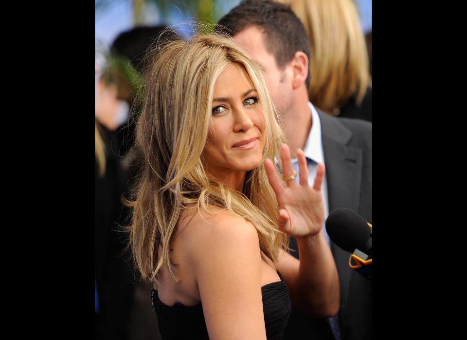 NEW YORK, NY - FEBRUARY 08:  Actress Jennifer Aniston speaks to the press during the premiere of 'Just Go With It' at Ziegfeld Theatre on February 8, 2011 in New York City.  (Photo by Jemal Countess/Getty Images)