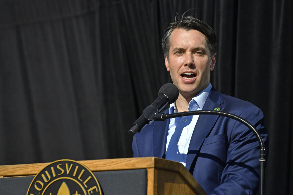 Rep. Morgan McGarvey, D-Ky., speaks during a vigil for the victims of Monday's shooting in Louisville, Ky., Wednesday, April 12, 2023. (AP Photo/Timothy D. Easley)