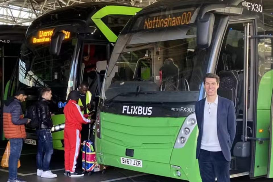 UK managing director Andreas Schorling with a FlixBus coach (Flixbus)